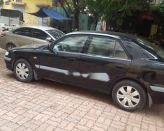 Mazda 626   2005 - Cần bán Mazda 626 đời 2005, màu đen, xe gia đình, giá chỉ 175 triệu giá 175 triệu tại Hà Nội