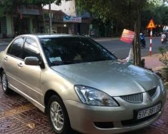 Mitsubishi Lancer 2004 - Bán Mitsubishi Lancer sản xuất năm 2004, màu ghi vàng giá 240 triệu tại Gia Lai