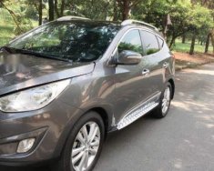 Hyundai Tucson AT 2009 - Cần bán lại xe Hyundai Tucson AT 2009, màu xám  giá 605 triệu tại Tp.HCM