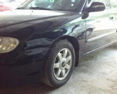 Kia Spectra 2004 - Cần bán Kia Spectra đời 2004, màu đen, máy chất nổ êm ái, máy lạnh tê tái, nội thất đẹp giá 120 triệu tại Kon Tum