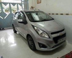 Chevrolet Spark LT 2014 - Gia đình bán Chevrolet Spark LT sản xuất năm 2014, màu bạc giá 230 triệu tại Tp.HCM