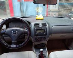 Mazda 323   2003 - Cần bán Mazda 323 sản xuất 2003, màu đen, nhập khẩu chính chủ, giá chỉ 145 triệu giá 145 triệu tại Vĩnh Phúc