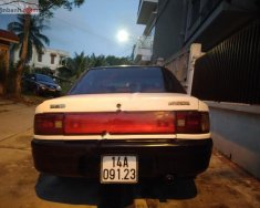 Mazda 323 1996 - Cần bán gấp Mazda 323 đời 1996, màu trắng, nhập khẩu nguyên chiếc giá 55 triệu tại Quảng Ninh