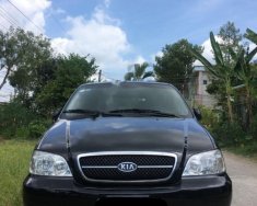 Kia Carnival GS 2006 - Bán Kia Carnival GS năm 2006, màu đen giá 219 triệu tại Tiền Giang