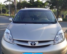 Toyota Sienna LE 2007 - Cần bán lại xe Toyota Sienna LE năm sản xuất 2007, màu vàng, xe nhập còn mới giá 666 triệu tại Tp.HCM