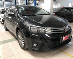 Toyota Corolla altis G 2015 - Cần bán Toyota Corolla altis G đời 2015, màu đen, giá 700tr giá 700 triệu tại Tp.HCM