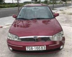 Ford Laser Ghia 2003 - Bán xe Ford Laser Ghia sản xuất 2003, màu đỏ, giá chỉ 225 triệu giá 225 triệu tại Tây Ninh