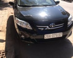 Toyota Corolla altis 1.8G MT 2010 - Bán Toyota Corolla altis 1.8G MT sản xuất 2010, màu đen số sàn giá 390 triệu tại Sơn La