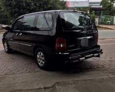 Kia Carnival GS 2006 - Cần bán xe Kia Carnival năm 2006 màu đen, giá chỉ 220 triệu, nhập khẩu giá 220 triệu tại Quảng Ngãi