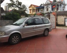 Kia Carnival 2007 - Cần bán Kia Carnival đời 2007, màu bạc số sàn giá 210 triệu tại Hải Dương