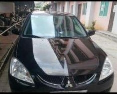 Mitsubishi Lancer 2004 - Bán xe Mitsubishi Lancer 2004, màu đen xe gia đình, 232 triệu giá 232 triệu tại Nghệ An