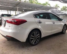 Kia K3 AT 2016 - Cần bán lại xe Kia K3 AT đăng ký lần đầu 2016, màu trắng ít sử dụng, 595 triệu giá 595 triệu tại Hải Dương
