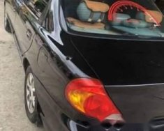 Kia Spectra   2003 - Cần bán lại xe Kia Spectra 2003, màu đen, 125 triệu giá 125 triệu tại Hà Giang