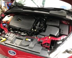 Ford Focus Titanium 2016 - Cần bán gấp Ford Focus Titanium sản xuất 2016, màu đỏ ít sử dụng  giá 665 triệu tại Tp.HCM