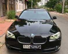 BMW 5 Series 523i  2010 - Cần bán lại xe BMW 5 Series 523i sản xuất 2010, màu đen  giá 865 triệu tại Tp.HCM