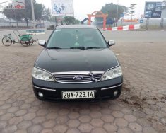 Ford Laser Ghia 2004 - Bán Ford Laser Ghia 2004, màu đen như mới, giá tốt giá 160 triệu tại Hà Nội