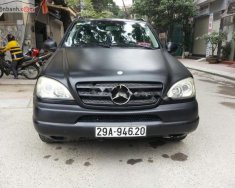 Mercedes-Benz ML Class ML320 2002 - Cần bán gấp xe Mercedes ML320 sản xuất năm 2002, đăng ký lần đầu 2007, số tự động, máy xăng, màu đen giá 360 triệu tại Hà Nội