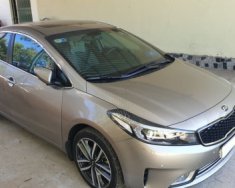 Kia Cerato  2.0 AT  2017 - Chính chủ bán lại xe Kia Cerato 2.0 AT đời 2017, màu vàng giá 630 triệu tại Ninh Thuận