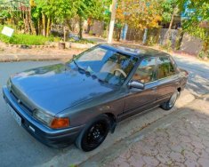 Mazda 323 1.6 MT 1996 - Cần bán Mazda 323 1.6 MT năm sản xuất 1996, màu xám  giá 65 triệu tại Hà Nam