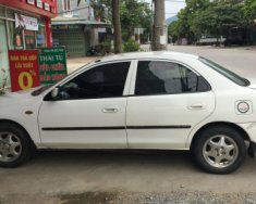 Mazda 323 2000 - Cần bán xe Mazda 323 sản xuất 2000, màu trắng giá 89 triệu tại Cao Bằng