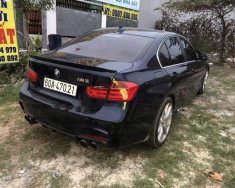 BMW 3 Series 320I 2014 - Cần bán gấp BMW 3 Series 320I sản xuất năm 2014, màu đen, nội thất zin, đồ chơi đầy đủ giá 1 tỷ tại Bình Dương