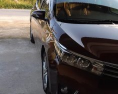 Toyota Corolla altis 1.8G MT 2015 - Bán Toyota Corolla altis 1.8G MT đời 2015, màu nâu, đẹp như mới giá 580 triệu tại Vĩnh Phúc