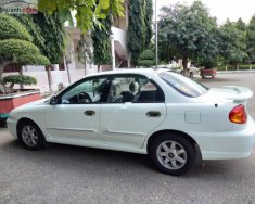 Kia Spectra 1.6 MT 2003 - Cần bán xe Kia Spectra 1.6 MT đời 2003, màu trắng giá 130 triệu tại Ninh Thuận