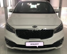 Kia Sedona 2.2 DATH 2016 - Bán Kia Sedona 2.2 DATH sản xuất năm 2016, màu trắng giá 1 tỷ 60 tr tại Hậu Giang