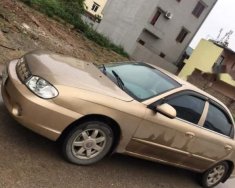 Kia Spectra   2004 - Cần bán lại xe Kia Spectra năm sản xuất 2004, màu vàng giá 105 triệu tại Thái Nguyên