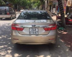 Toyota Camry 2013 - Cần bán Toyota Camry đời 2013, màu vàng, xe nhập chính chủ, 730 triệu giá 730 triệu tại Lào Cai