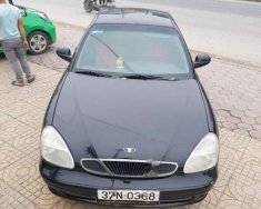 Daewoo Nubira 2002 - Cần bán gấp Daewoo Nubira 2002, màu đen, nhập khẩu nguyên chiếc, 82tr giá 82 triệu tại Hà Tĩnh