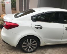 Kia K3 MT 2015 - Cần bán lại xe Kia K3 MT đời 2015, màu trắng xe gia đình, giá 420tr giá 420 triệu tại Đồng Nai