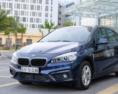 BMW 2 Series 218i Active 2015 - Cần bán xe BMW 2 Series 218i Active sản xuất 2015, xe gia đình, lanh lẹ gọn gàng, cốp rộng rãi giá 930 triệu tại Tp.HCM