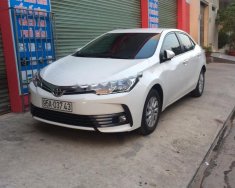 Toyota Corolla altis 1.8E 2017 - Bán xe Toyota Corolla altis 1.8E sản xuất 2017, màu trắng chính chủ, 690 triệu giá 690 triệu tại Cần Thơ