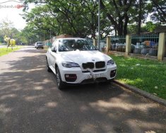 BMW X6 xDrive35i 2014 - Cần bán lại xe BMW X6 xDrive35i đời 2014, màu trắng, nhập khẩu nguyên chiếc   giá 1 tỷ 950 tr tại Đắk Lắk