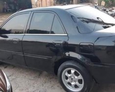 Mazda 323 Classic GLX 2004 - Bán gấp Mazda 323 Classic GLX sản xuất năm 2004, màu đen   giá 145 triệu tại Kon Tum