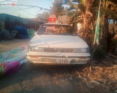 Nissan Bluebird 1990 - Bán Nissan Bluebird sản xuất năm 1990, màu vàng giá 45 triệu tại Cần Thơ