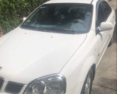 Daewoo Lacetti  MT 2004 - Bán ô tô Daewoo Lacetti MT sản xuất năm 2004, màu trắng, nội thất zin nguyên bản giá 170 triệu tại Bình Dương