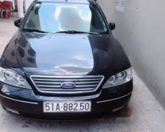 Ford Mondeo 2004 - Cần bán gấp Ford Mondeo đời 2004, màu đen, xe nhập giá 180 triệu tại Tiền Giang