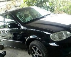 Kia Carnival  MT 2007 - Cần bán lại xe Kia Carnival MT đời 2007, màu đen xe gia đình sử dụng, 7 chỗ giá 300 triệu tại Bến Tre