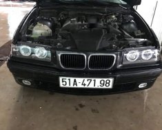 BMW 3 Series  320i 1997 - Bán ô tô BMW 3 Series 320i đời 1997, màu đen, xe nhập, 140 triệu giá 140 triệu tại Tp.HCM