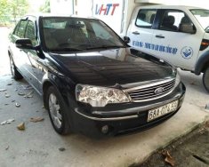 Ford Laser   2004 - Bán ô tô Ford Laser năm sản xuất 2004, màu đen, nhập khẩu giá 210 triệu tại Kiên Giang