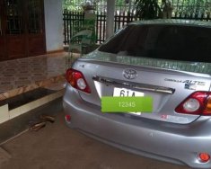 Toyota Corolla altis 2010 - Cần bán lại xe Toyota Corolla Altis năm 2010, màu bạc xe gia đình, giá tốt giá 385 triệu tại Bình Phước