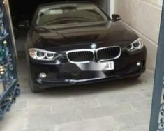 BMW 3 Series 320i  2014 - Cần bán lại xe BMW 3 Series 320i 2014, màu đen, xe nhập xe gia đình giá 1 tỷ 20 tr tại Tp.HCM