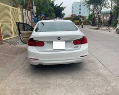 BMW 3 Series 320i 2014 - Cần bán xe BMW 320i 2014 ĐK 2015, số tự động, màu trắng giá 915 triệu tại Tp.HCM