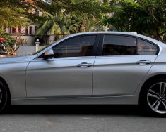 BMW 3 Series 320I 2014 - Bán BMW 320i Sportline 2014 màu bạc chính chủ giá 828 triệu tại Tp.HCM