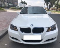 BMW 3 Series  320i  2009 - Cần bán xe BMW 320i màu trắng sản xuất 2009, đăng ký 2010 giá 450 triệu tại Tp.HCM