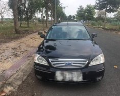 Ford Mondeo   2V  2006 - Bán Ford Mondeo 2V đời 2006, màu đen, xe đang sử dụng không lội nước và cấn mốp giá 235 triệu tại Tiền Giang