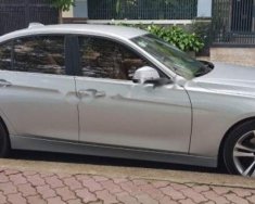 BMW 3 Series 320i 2014 - Cần bán gấp BMW 3 Series 320i năm 2014, màu bạc, nhập khẩu giá 810 triệu tại Tp.HCM