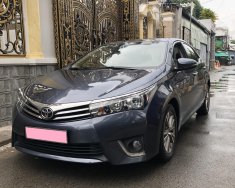 Toyota Corolla altis 1.8MT 2015 - Bán xe Toyota Altis 1.8MT 2015 màu xanh, đi 42.000 km giá 565 triệu tại Tp.HCM